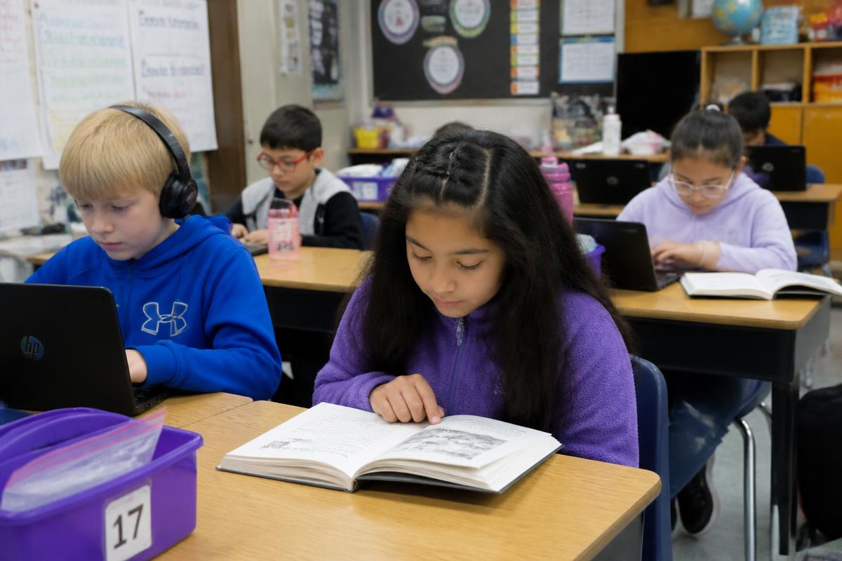 New books and laptops for Lincoln Elementary